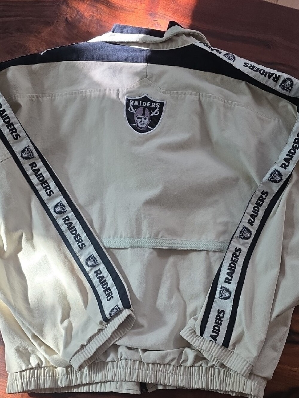 Pro Player🏈 VINTAGE🏈 Oakland Raiders Beige and Black Track Jacket